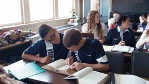 Dayspring christian academy students study the Bible together in class